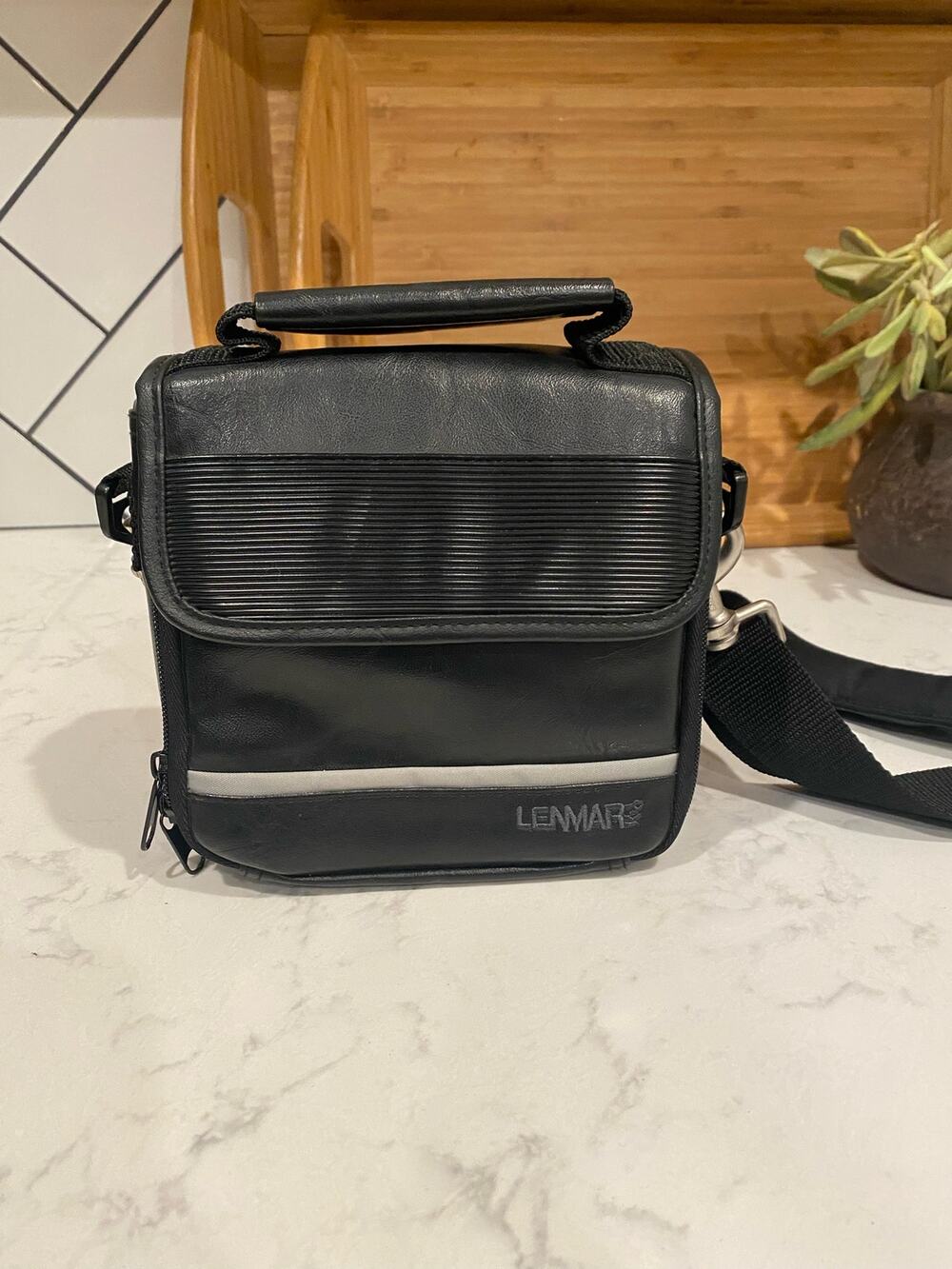Lenmar faux leather shoulder camera bag  hand held or shoulder strap vintage?